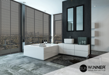 Upmarket stylish bathroom interior with grey stone tiled floor overlooking a city through huge floor-to-ceiling windows and a door leading to a patio, 3d rendering