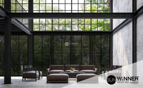 Loft style living room with nature view 3d rendering image.There are white brick wall,polished concrete floor and black steel structure.Furnished with dark brown leather sofa.